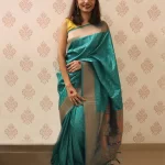 Green color Paithani Art Silk saree with copper Zari weaving work